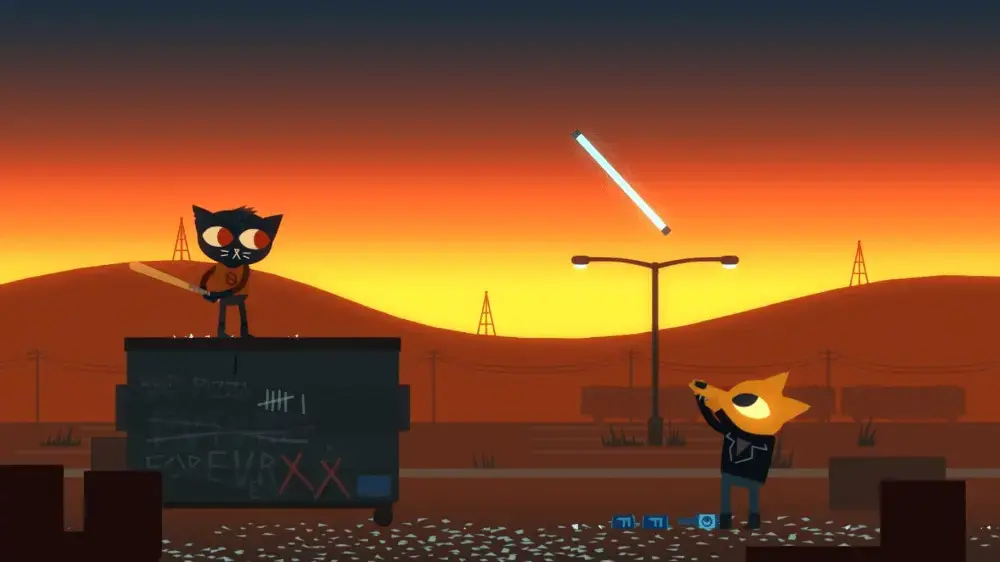 Mae breaking lights on top of a dumpster
