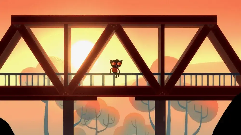 Mae sitting on a bridge rail with a sun setting in the backdrop